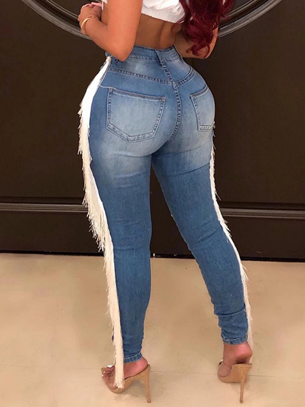 HIGH WAIST DISTRESSED TASSEL JEANS